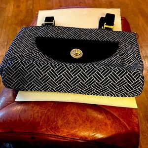 Lovely black and white Baggallini tote. Gold accents